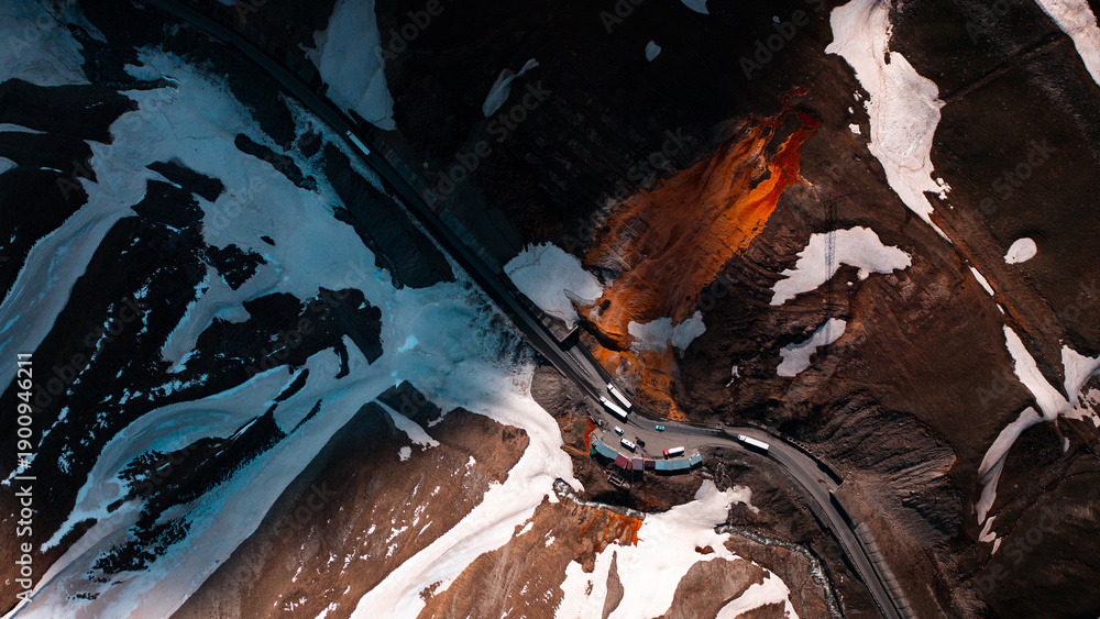 Fototapeta premium Rad mineral waterfall in Gudauri aerial top down view, Georgia