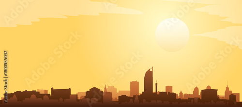 Golden yellow panoramic poster of the city skyline with misty background buildings and clouds of THE HAGUE, NETHERLANDS