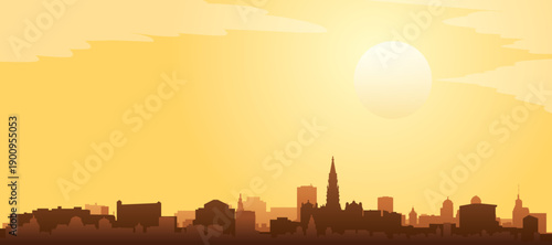 Golden yellow panoramic poster of the city skyline with misty background buildings and clouds of BRUSSELS, BELGIUM