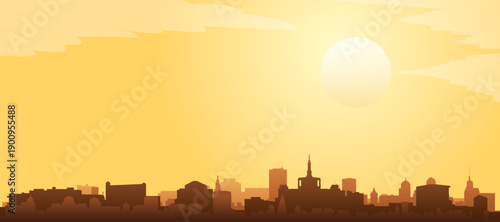 Golden yellow panoramic poster of the city skyline with misty background buildings and clouds of BUCHAREST, ROMANIA