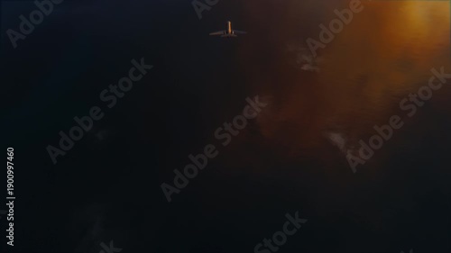 High-angle 3D animation of a sleek black business jet flying vertically across the screen over deep blue ocean water.