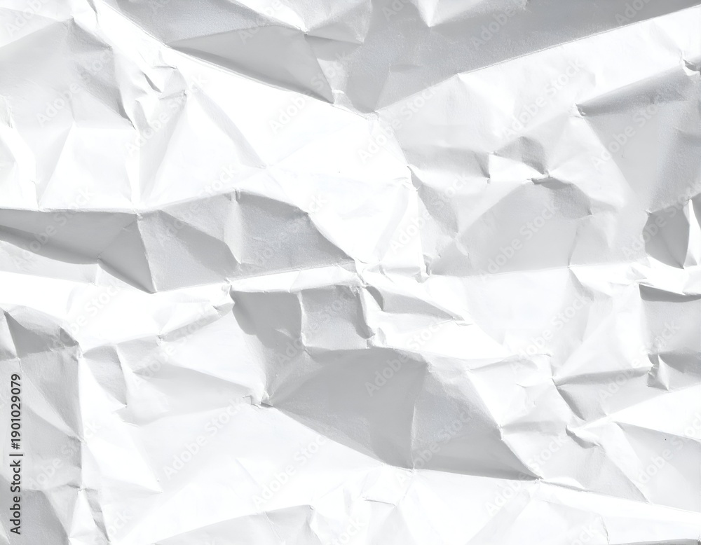 Obraz premium Close-up of a white, crumpled paper sheet, showing texture and shadows