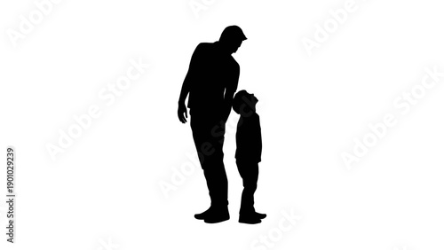 Silhouette of Father and Son Bond Standing Together