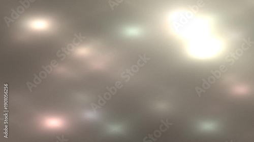 A soft, blurred background with illuminated spots creating a dreamy atmosphere