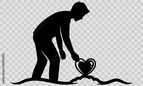 Silhouette of a person planting a heart shaped object in the ground with care and devotion