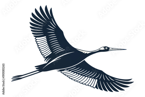 Dark blue bird in flight with spread wings soaring