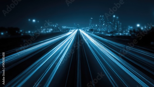 Streaking lights on a highway at night with city skyline in background