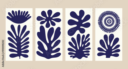 A set of four abstract art prints featuring dark blue organic shapes resembling plants and flowers on a cream background.
