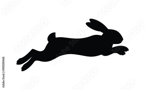 Black silhouette of a rabbit in mid hop on white background symbolizing speed and agility in a minimalist graphic design
