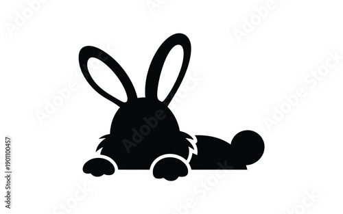 Black silhouette of a rabbit lying down with long ears on a white background minimalist design simple illustration cute animal graphic