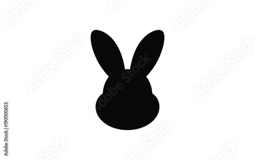 Black silhouette of a bunny head with long ears on white background symbolizing easter or springtime