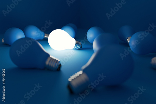 Schilderij op canvas Glowing light bulb rising above many blue matte bulbs on a blue background