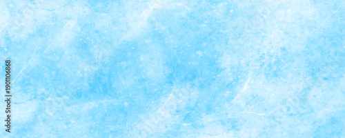 Abstract grunge watercolor background in soft light blue and pale cyan tones, with irregular splashes, ink blots. blue marble texture. blue ice on watercolor and snow.