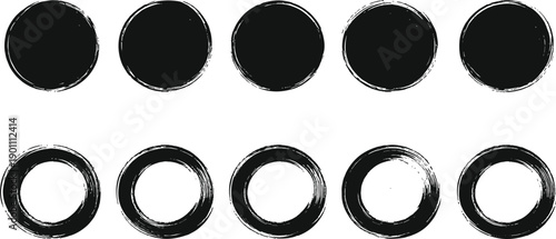 Black grunge circle and ring shape collection with rough brush edges, hand drawn paint textures, abstract round elements isolated on white background