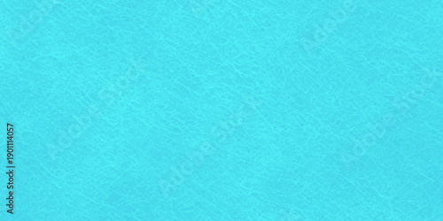 Light blue watercolor paper texture offers an abstract grunge background with a vintage paint pattern on a rough aged canvas surface for a retro art design