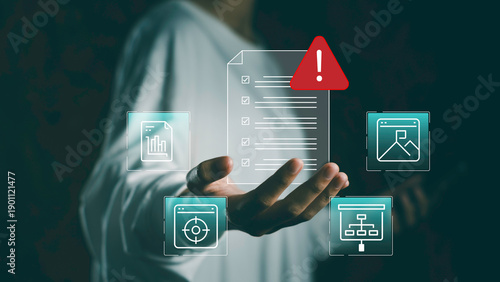 Businessman holding virtual warning checklist interface with document icons, Risk assessment, strategic planning, asset identification, and impact management for future challenges.