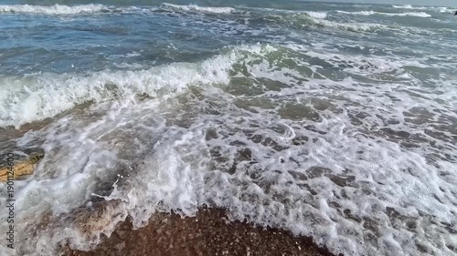Waves crash on the shore of the Caspian Sea