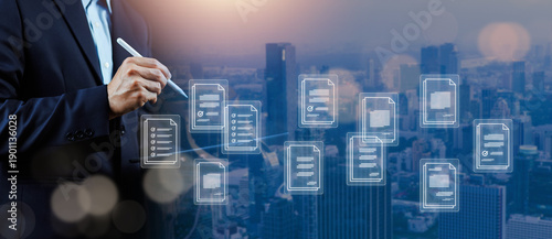Businessman managing digital documents and workflow system with virtual file icons over city background. Concept of paperless office, document management, smart business process digital transformation