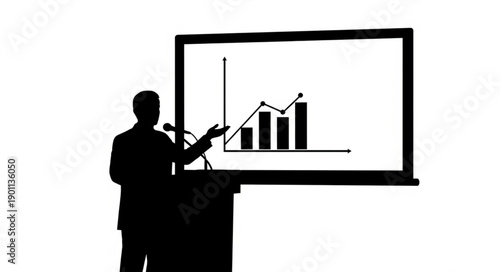 Silhouette of a man presenting a business graph on a screen.