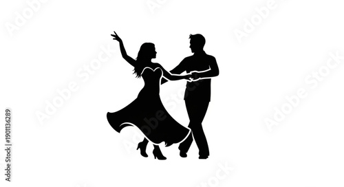 Silhouette of a couple dancing ballroom dance gracefully.