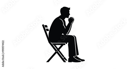 Silhouette of a man sitting on a chair with his hands clasped in front of his face, appearing to be in deep thought or prayer.