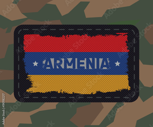 Tactical army textile chevron patch with the flag of Armenia on army camouglage background