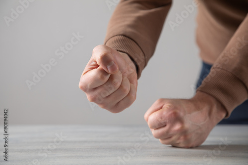 Konstfotografi Caucasian angry and aggressive man threatening with fist.