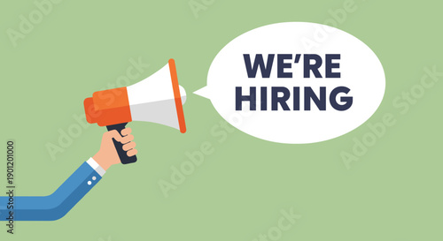 Hand holding megaphone announcing 'we're hiring' with speech bubble and green background representing recruitment job opportunities and company