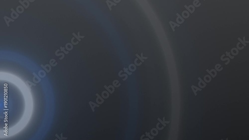 A smooth gradient with a central blue glow on a dark background enhances simplicity