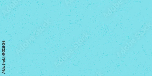 A blank vintage blue paper background featuring a rough grunge texture and old weathered surface material for a seamless art design backdrop