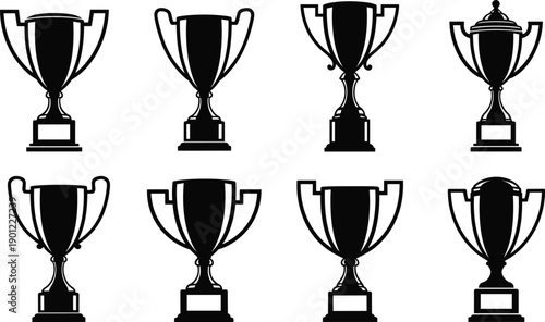 Set of nine black and white trophy cups in different styles