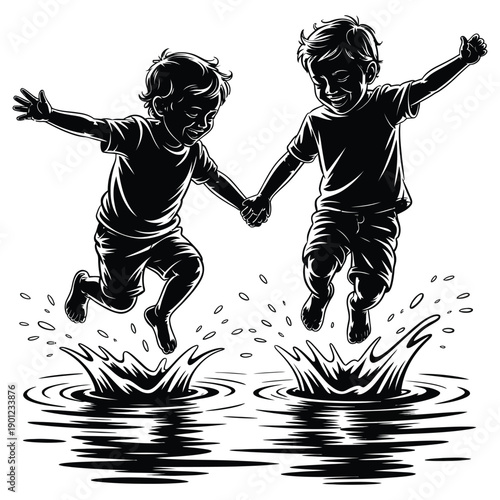 Two joyful young boys jumping into water puddles with hands held together during playtime outdoor activity showing childhood friendship and happiness in black and white silhouette