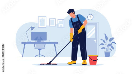 Professional male cleaner wearing blue overalls and yellow gloves mopping the floor in a tidy modern office with a wooden desk and computer.