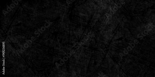 Dark grunge texture with deep black and charcoal tones, featuring rough, cracked surfaces and subtle scratches. cement concrete wall and ceramic tiles background. gray dirty stan, rusty metal texture.