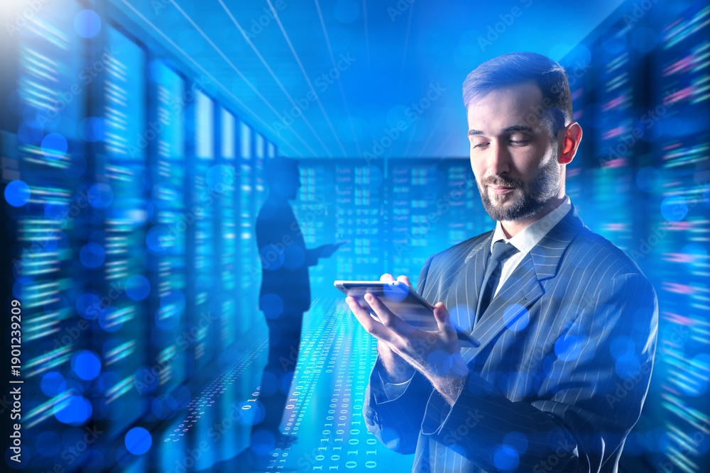 Fototapeta premium IT infrastructure management, business analyst uses tablet in data center, monitoring servers, digital networks, cloud systems, cybersecurity operations and data processing.