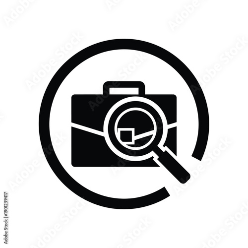 Black and white icon of a magnifying glass over a camera for search or investigation concept