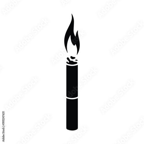 Simple black candle with flame burning brightly on top
