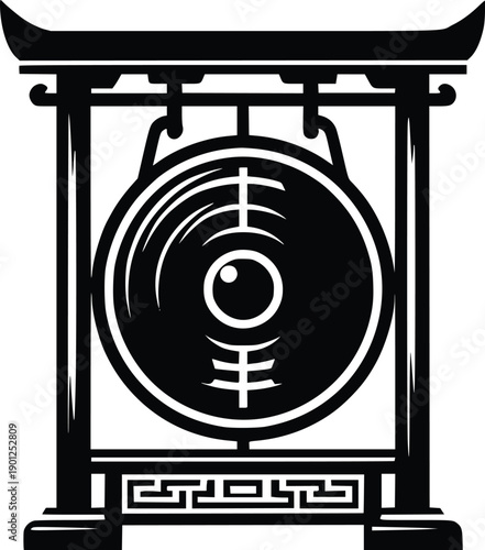 Traditional asian gong with ornate wooden frame and intricate details