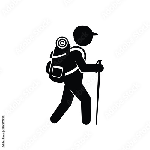 Black silhouette of a hiker with a backpack and trekking pole walking on a plain surface