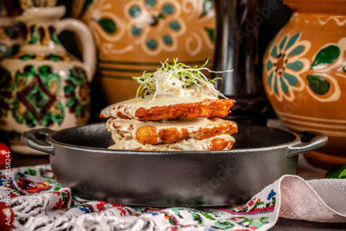 Crispy potato pancakes with creamy mushroom sauce