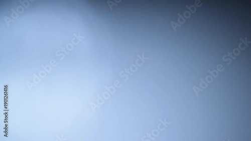 Modern cold white light transition with bokeh and lens flare for dynamic visuals