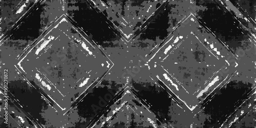 Abstract geometric pattern with repeating diamond shapes in grayscale