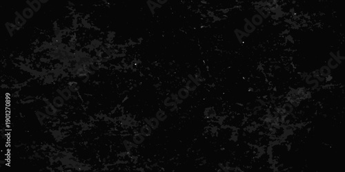 Abstract dark texture with scattered speckles and grainy background effect