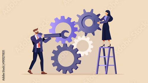 Teamwork and collaboration professionals working together on complex mechanical systems