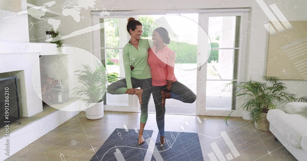 Fototapeta premium Practicing two women in activewear balancing on yoga mats in bright living room, with map overlays