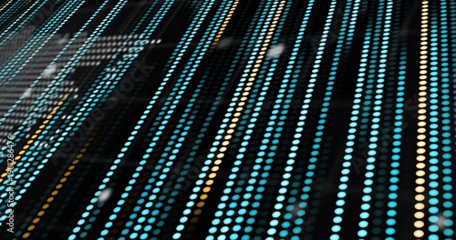 Displaying angled black LED panel glowing diagonally in dark, showing turquoise and yellow dots