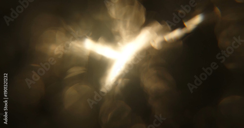 Fotografía An abstract photo featuring soft, diffused light reflections creating a bokeh effect on a dark background