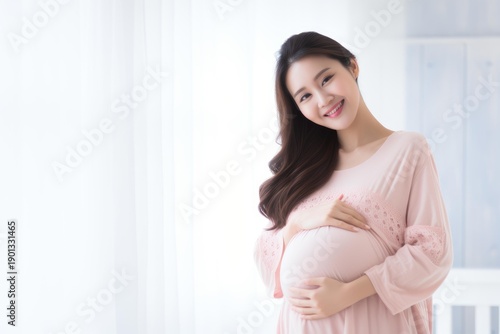 Smiling expecting woman feeling joy about pregnancy and future Free Download Smiling expecting woman feeling joy about pregnancy and future - GFXLoad