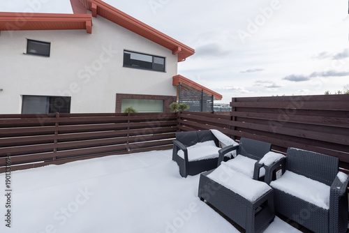 Wallpaper Mural Snow Covered Outdoor Patio with Furniture and Modern Home Torontodigital.ca