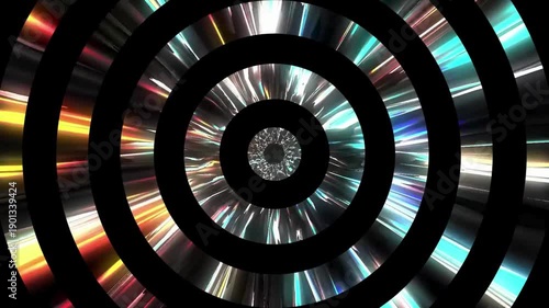 Abstract colorful concentric circles with radial light effects on black background